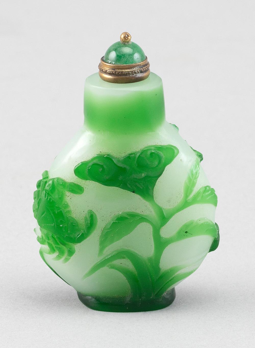 Appraisal: CHINESE GREEN-CUT-TO-WHITE OVERLAY GLASS SNUFF BOTTLE LATE TH CENTURY HEIGHT