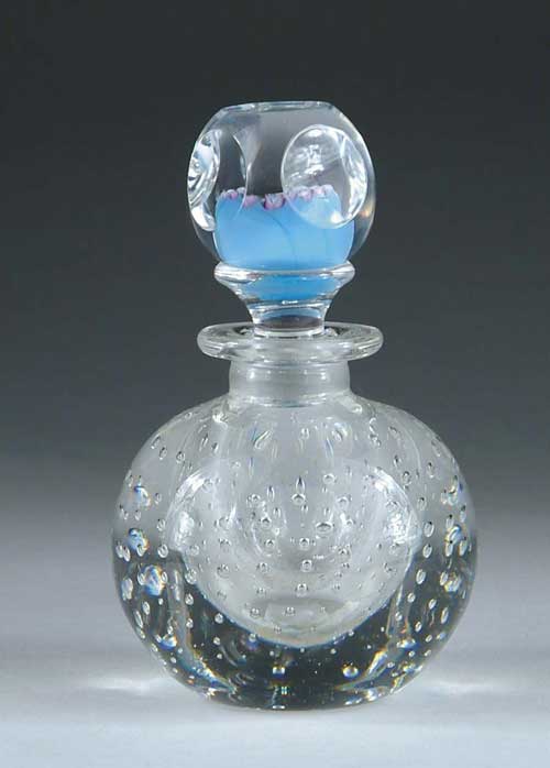 Appraisal: PAPERWEIGHT STOPPER BOTTLE Stopper has circle bevels with a blue