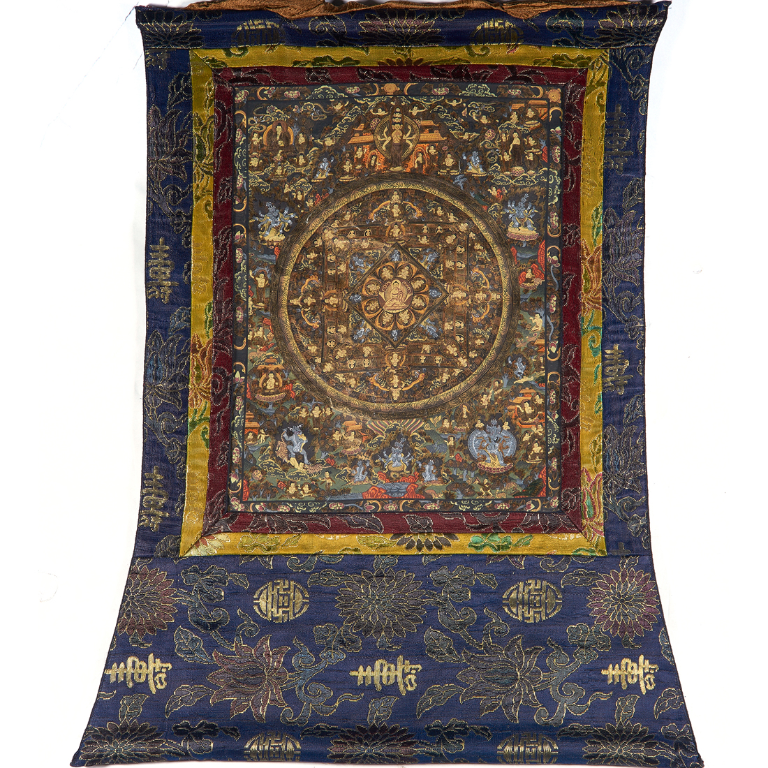 Appraisal: TIBETAN THANGKA Tibetan thangka depicting a mandala with the Buddha