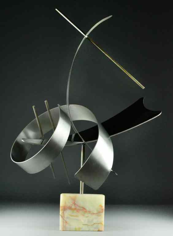 Appraisal: Curtis Jere Metal and Marble SculptureMid-century Modern brushed metal sculpture