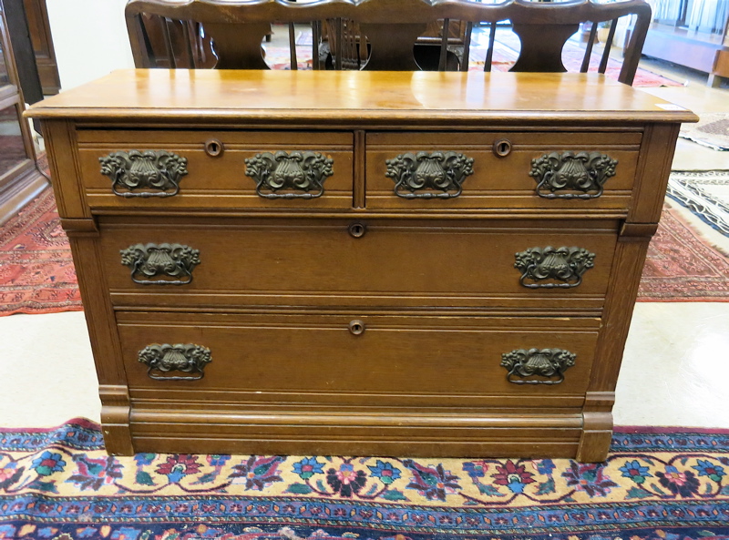 Appraisal: LATE VICTORIAN LOW OAK DRESSER American c having two small