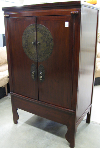 Appraisal: CHINESE MOON CABINET the double doors centering a large round