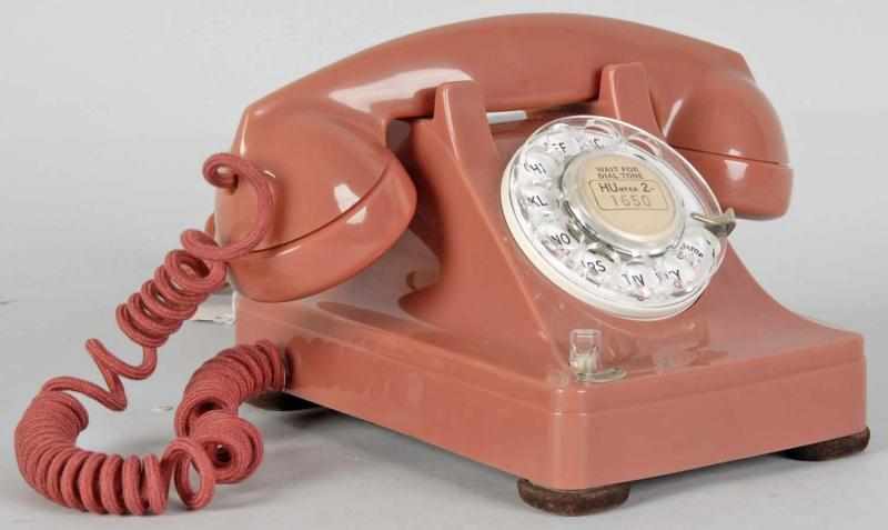 Appraisal: Rose Western Electric Telephone Description Shell and base dated Phone