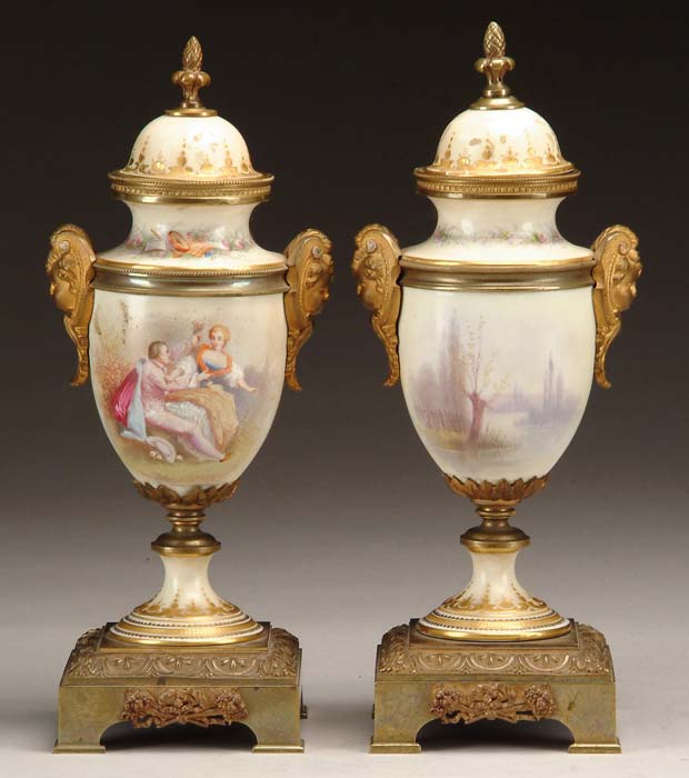 Appraisal: FINE PAIR OF ORMOLU AND PORCELAIN SEVRES TYPE URNS The