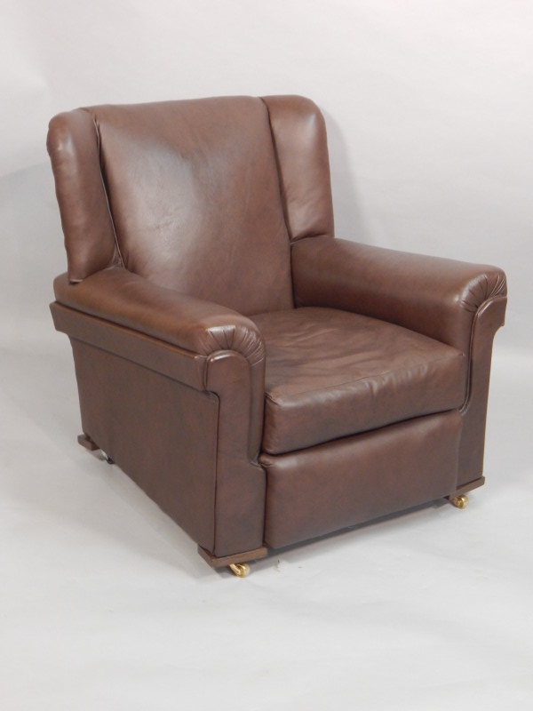 Appraisal: A s armchair later upholstered in brown leather on brass