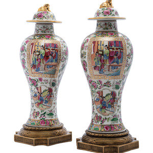 Appraisal: A Pair of Famille Rose Porcelain Gilt Metal Mounted Urns