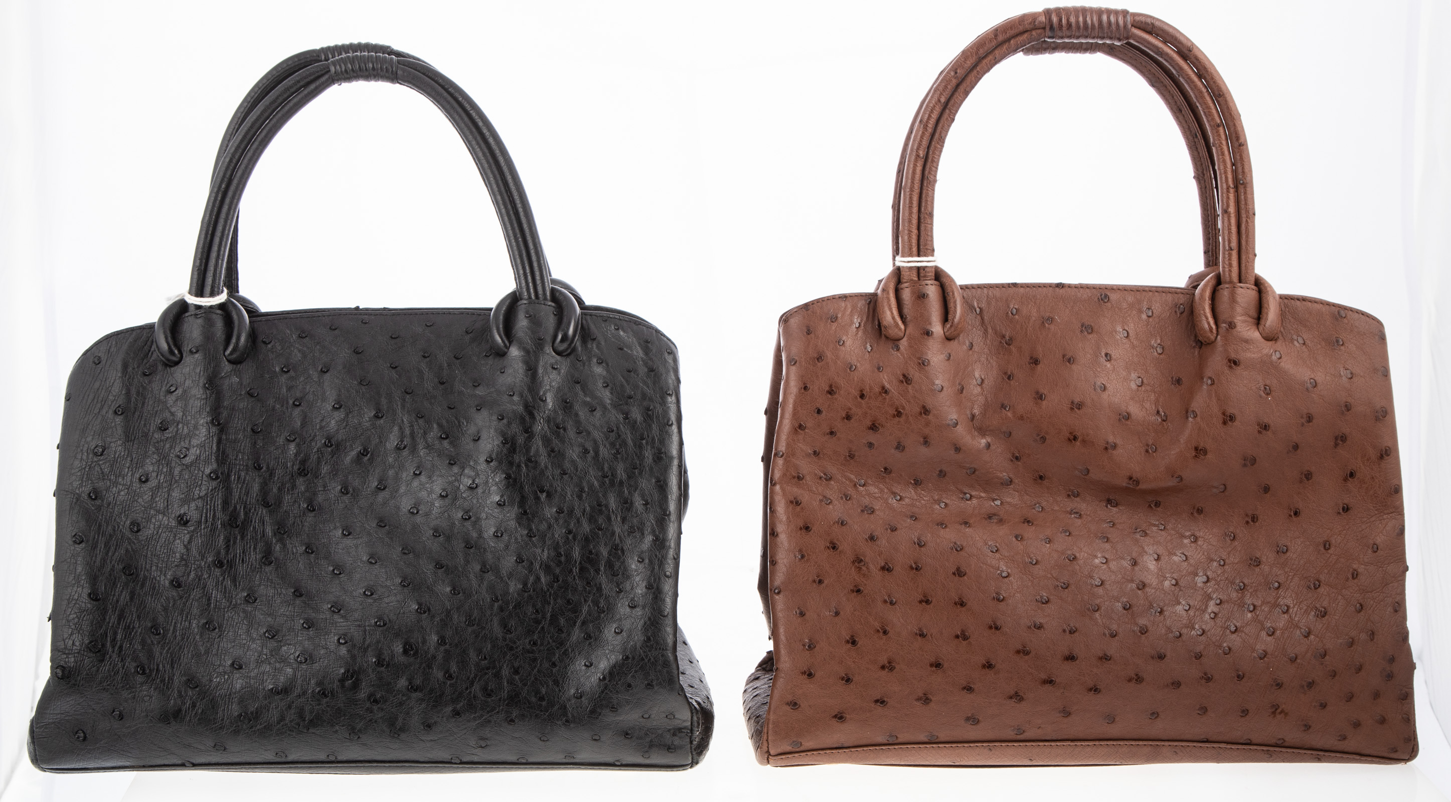 Appraisal: TWO RENE OSTRICH LEATHER HANDBAGS one black and one brown