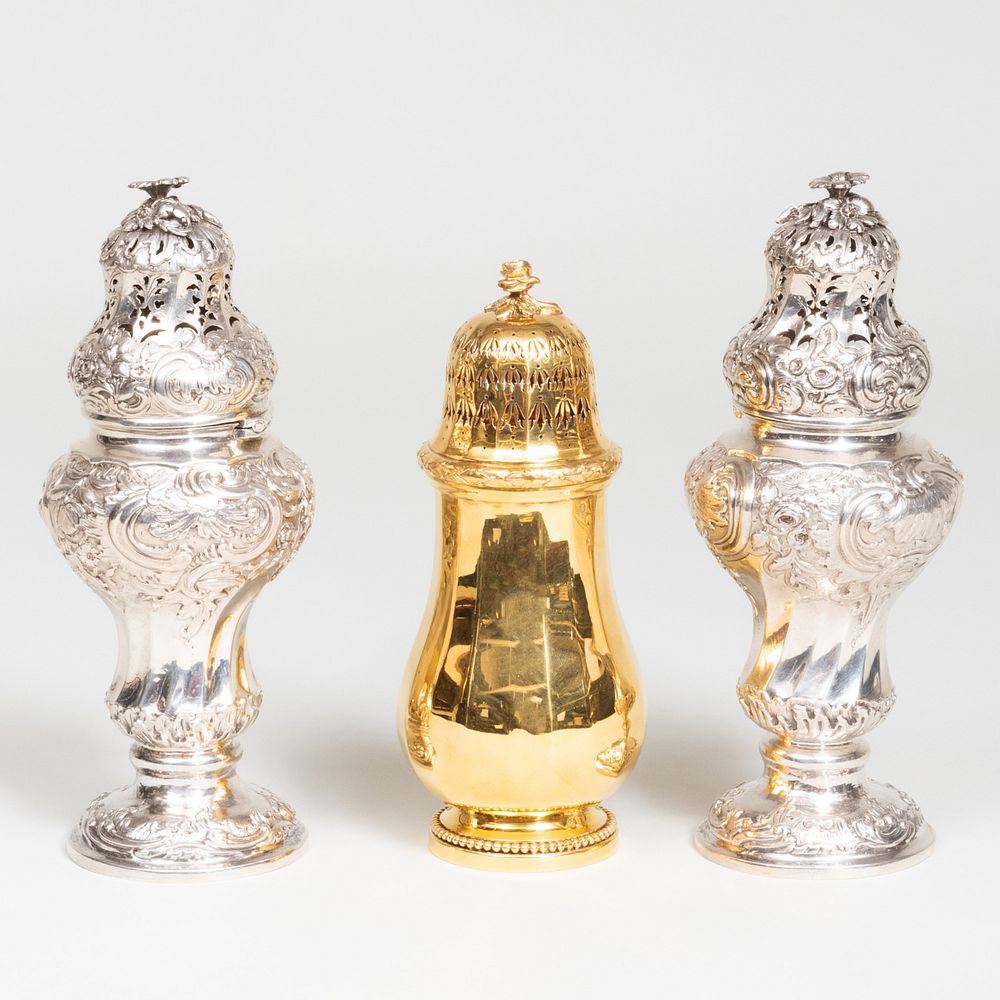 Appraisal: Pair of Swedish Silver Casters and a Puiforcat Silver-Gilt Caster