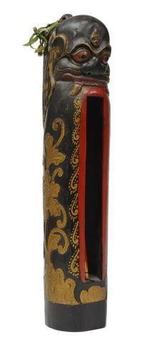 Appraisal: Southeast Asian carved wood slit drum modeled a demon with