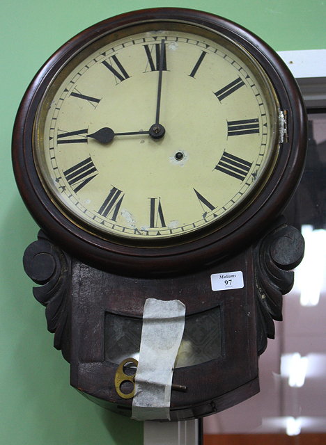 Appraisal: A MAHOGANY DROP DIAL WALL CLOCK the painted dial with