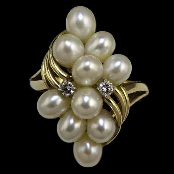 Appraisal: k Pearl and Diamond Ring k yellow gold ring containing