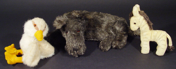 Appraisal: Farnell Scottie dog pyjama case with rotating head a Merrythought