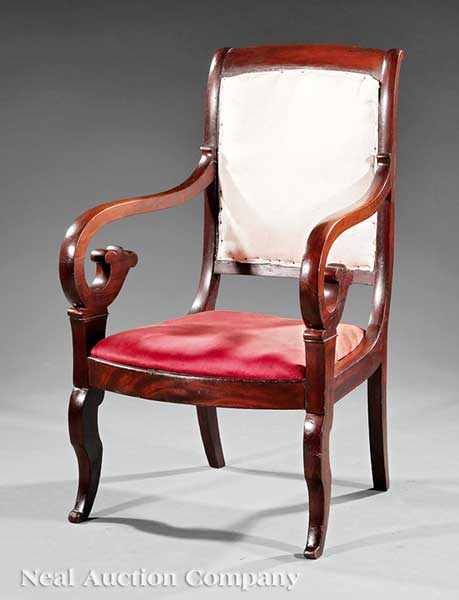 Appraisal: An American Classical Carved Mahogany Armchair c shaped padded back