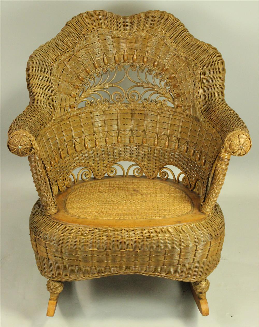 Appraisal: HEYWOOD WAKEFIELD ROCKER beautiful condition natural color with beadwork and