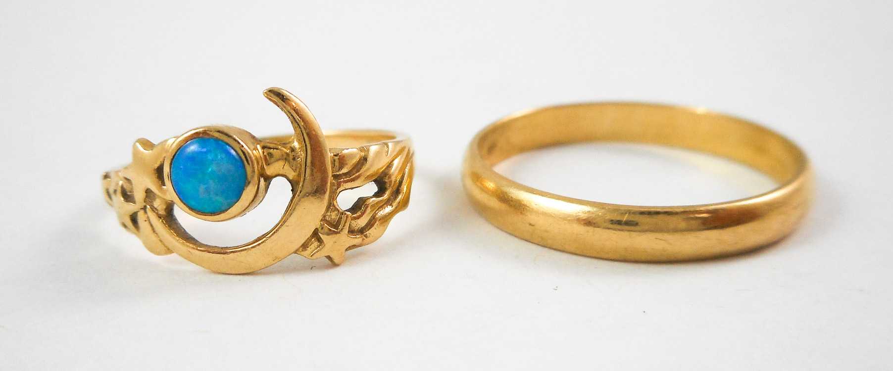 Appraisal: TWO FOURTEEN KARAT YELLOW GOLD RINGS including a size -