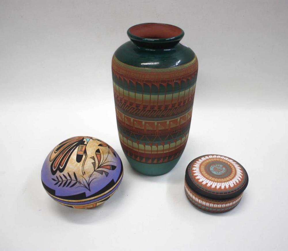 Appraisal: THREE CONTEMPORARY NAVAJO POTTERY VESSELS polychrome decorated of various motifs