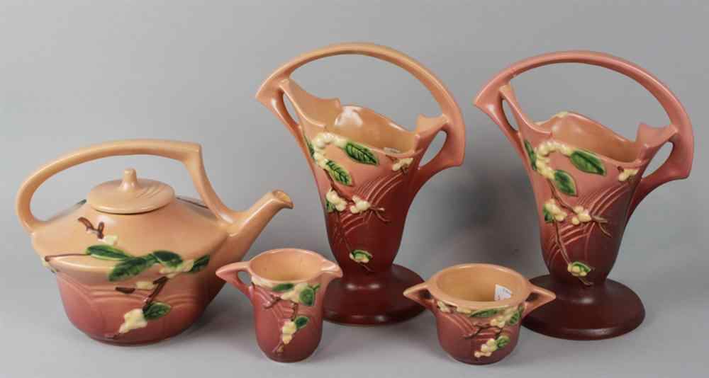 Appraisal: ROSEVILLE PINK SNOWBERRY PATTERN TEA SET comprising a teapot creamer