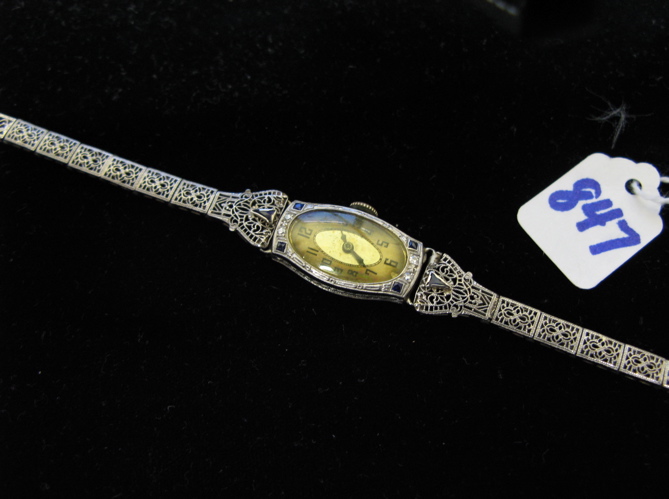 Appraisal: LADY'S ESTATE EIGHTEEN KARAT WHITE GOLD FILIGREE WRISTWATCH having a