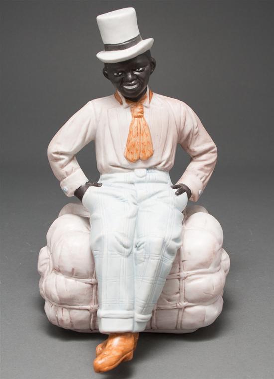 Appraisal: German painted bisque figure of a minstrel man seated on