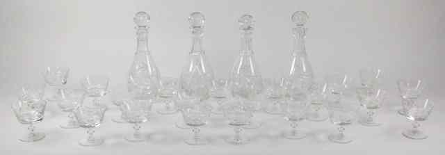 Appraisal: A set of four cut glass decanters and stoppers and