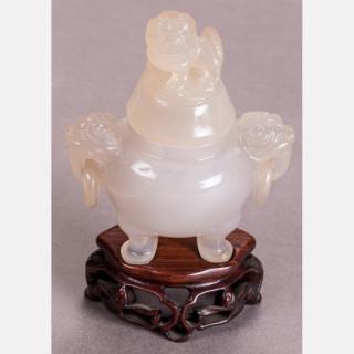 Appraisal: A Chinese Carved Agate Tripod Koro and Cover on a