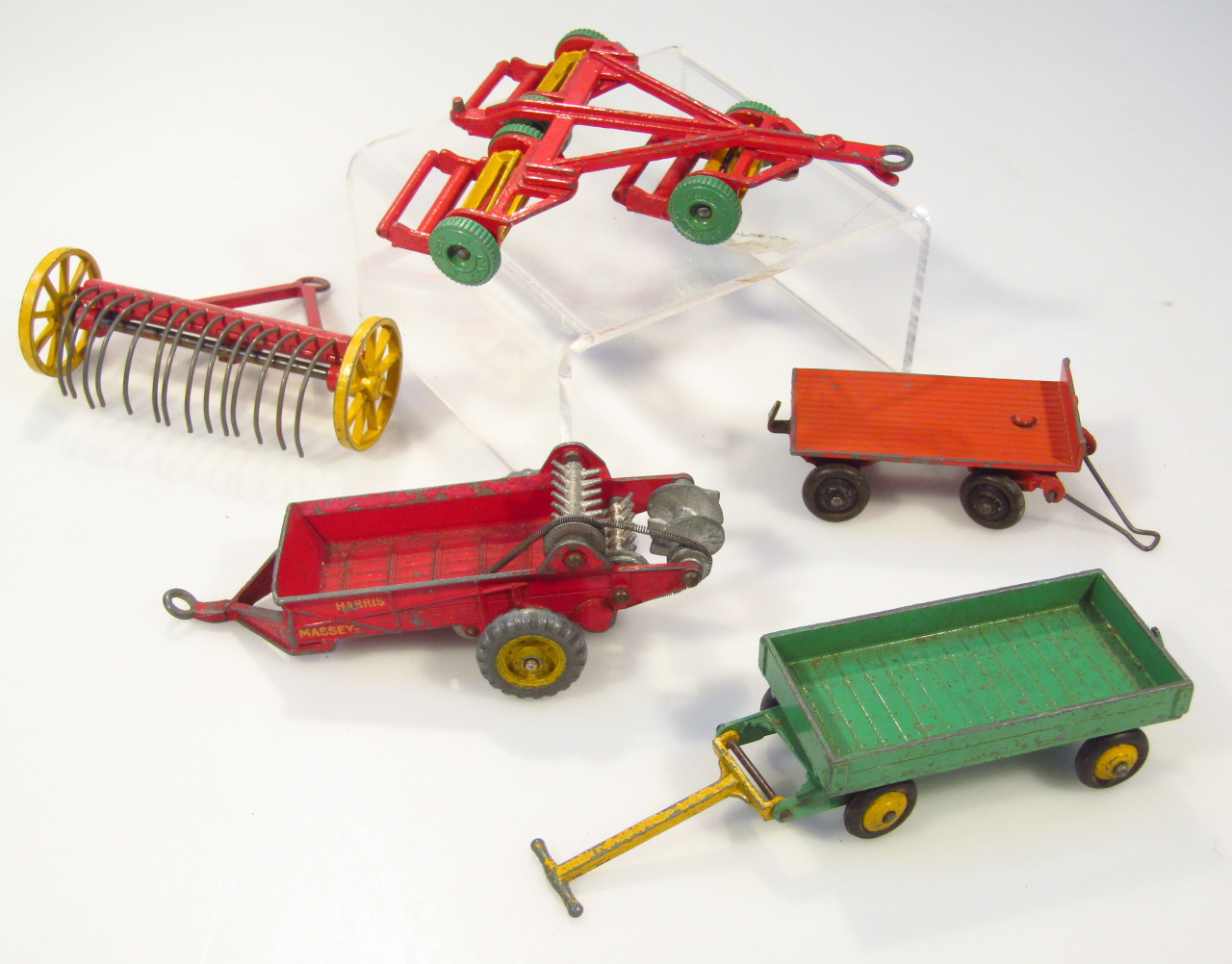 Appraisal: Various Dinky Toys implements trailer in green and yellow colourway