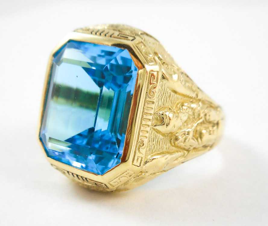 Appraisal: MAN'S BLUE TOPAZ AND FOURTEEN KARAT GOLD RING bezel set