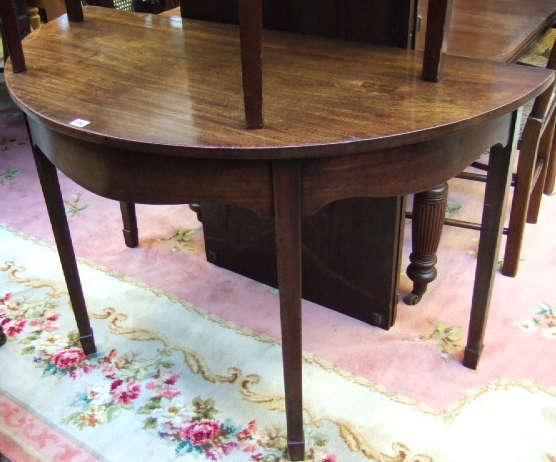 Appraisal: A George III mahogany 'D' end dining table raised on