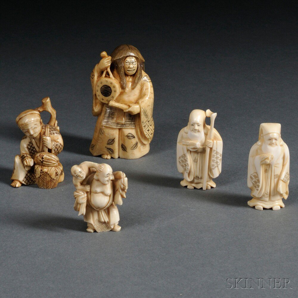 Appraisal: Five Carved Ivory Figurines Japan th th century a standing