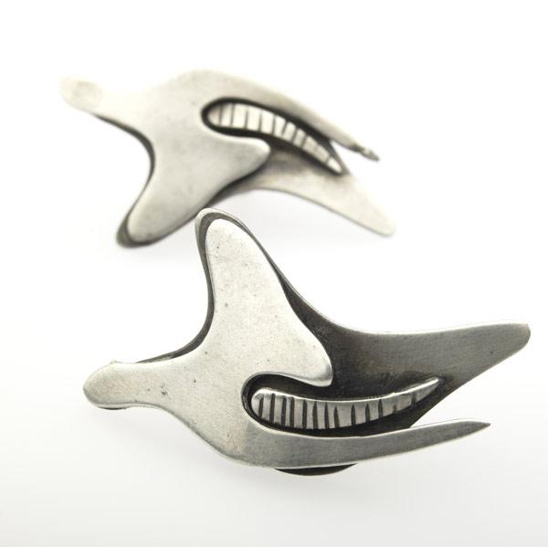 Appraisal: FRANK MIRAGLIA Pair of abstract sterling earrings Signed F MIRAGLIA