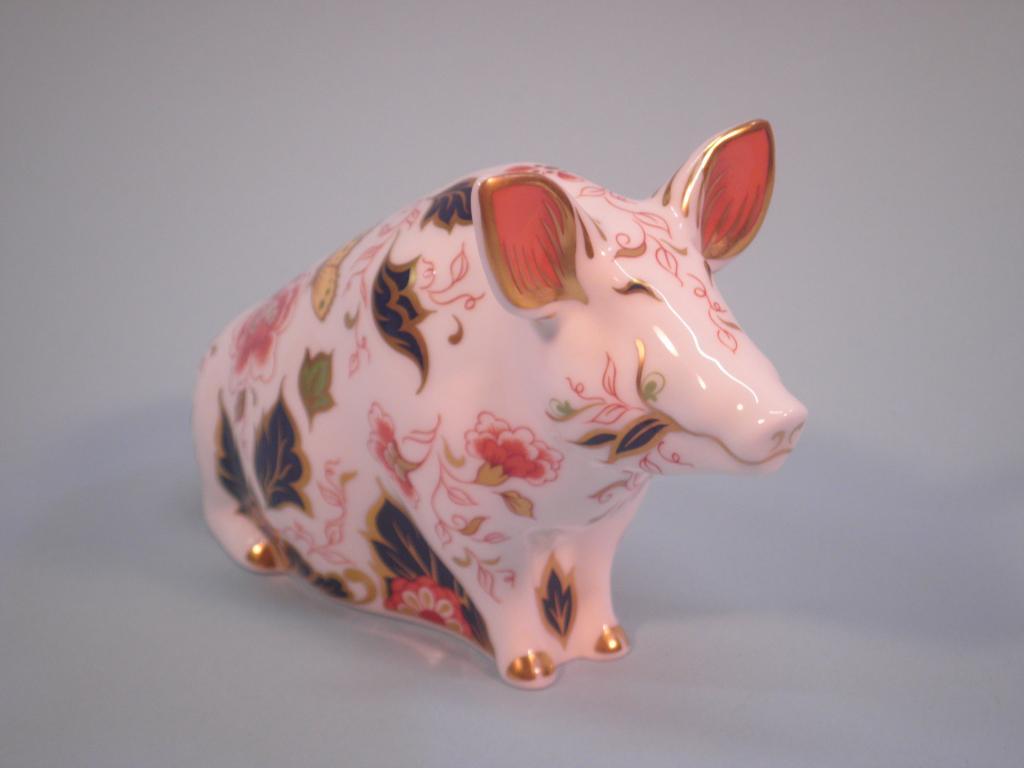 Appraisal: A Royal Crown Derby Imari figure of a sitting pig