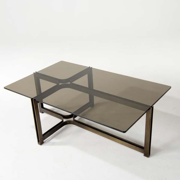 Appraisal: DUNBAR Cruciform coffee table in brushed bronze finish with smoked