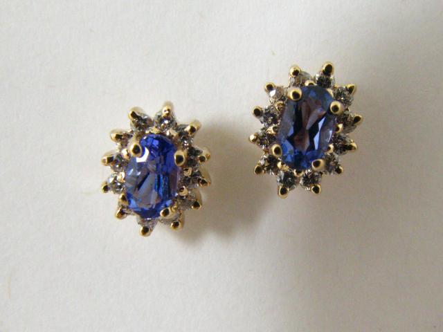 Appraisal: k yellow gold tanzanite and diamond ear studs MSRP sku