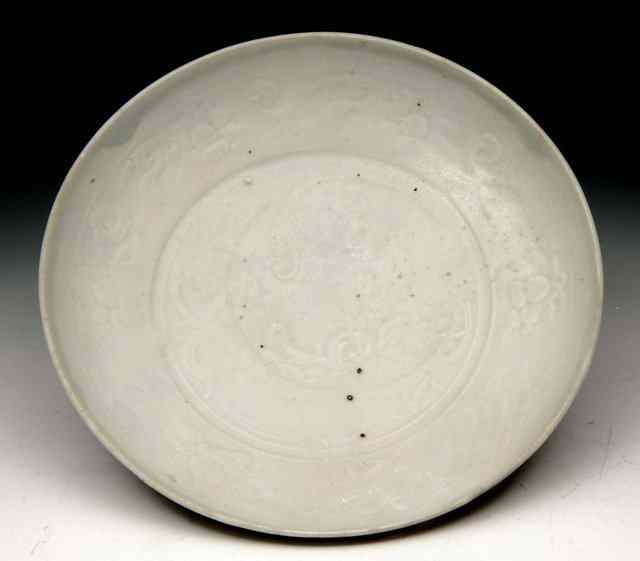 Appraisal: A CHINESE YUAN DYNASTY - QINGBAI DISH possibly from a