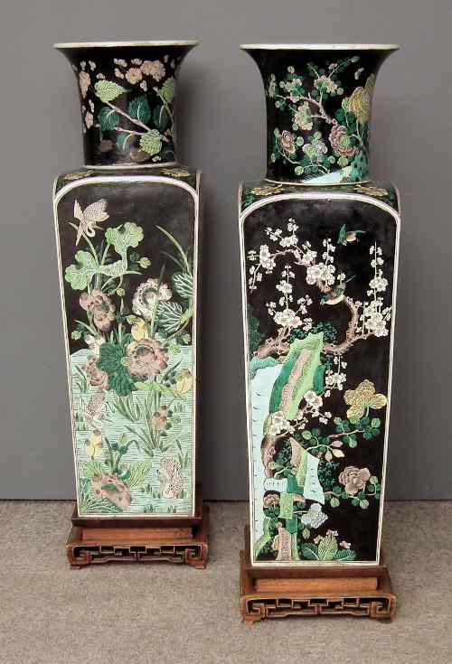 Appraisal: A pair Chinese porcelain ''Famille Noir'' Rouleau vases painted with