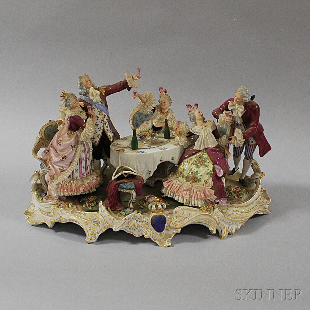 Appraisal: German Porcelain Figural Plateau th century depicting a group drinking