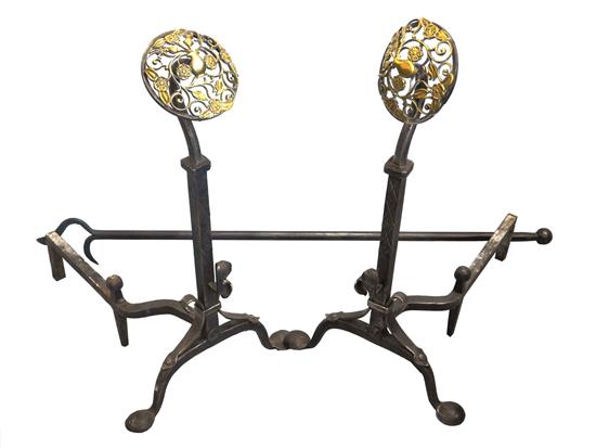 Appraisal: Pair of Aesthetic Movement andirons and poker th C circular