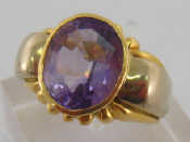 Appraisal: An Italian carat gold and amethyst dress ring the oval