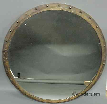 Appraisal: Massive iron framed porthole'' mirror ''dia