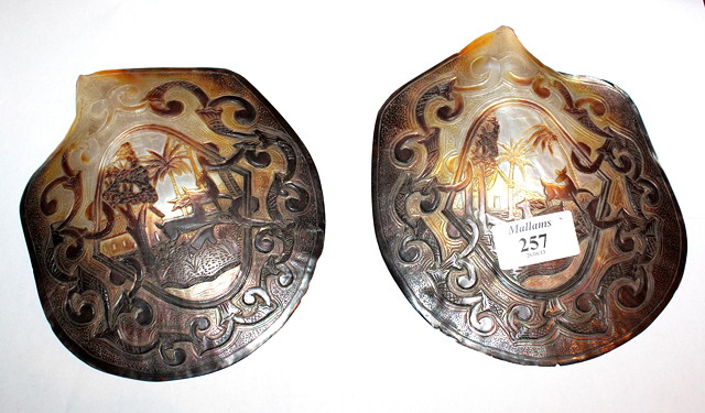 Appraisal: A PAIR OF MIDDLE EASTERN CARVED SHELLS with single panels