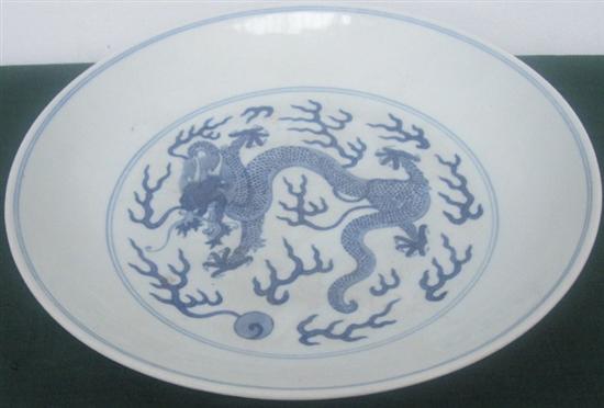 Appraisal: CHINESE SMALL CHARGER Blue and white with dragon and flaming