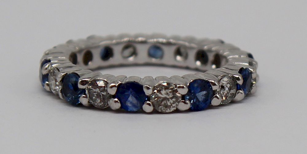 Appraisal: JEWELRY Platinum Diamond and Sapphire Eternity Band Ring Platinum eternity