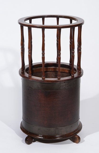 Appraisal: AN ANTIQUE OAK BRASS BOUND CYLINDRICAL STICK STAND with spindle