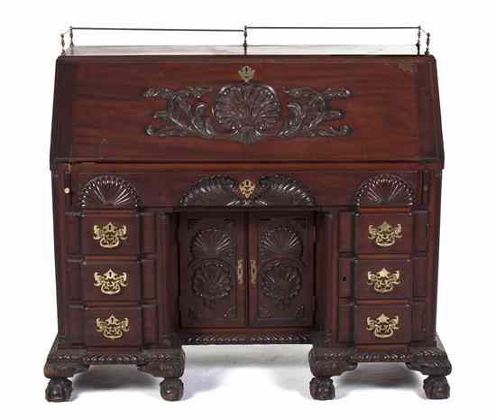 Appraisal: A Chippendale Style Mahogany Slant Front Bureau with three-quarter brass