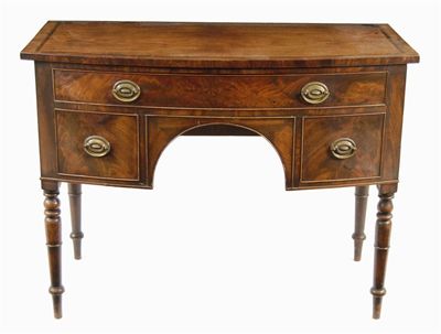 Appraisal: An early th century mahogany bowfront sideboard the top with