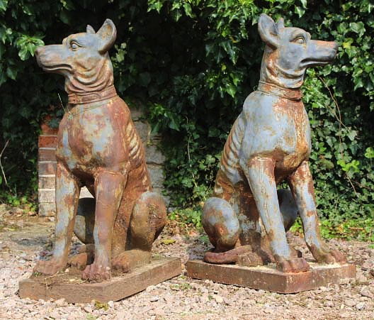 Appraisal: A PAIR OF GREY PAINTED CAST IRON DOGS seated and