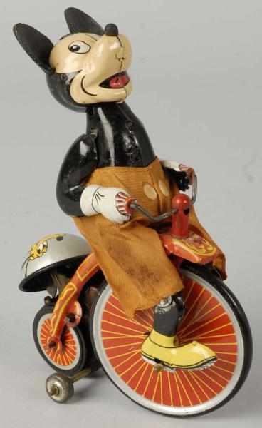 Appraisal: Tin Linemar Disney Mickey on Bicycle Wind-Up Toy Description Japanese