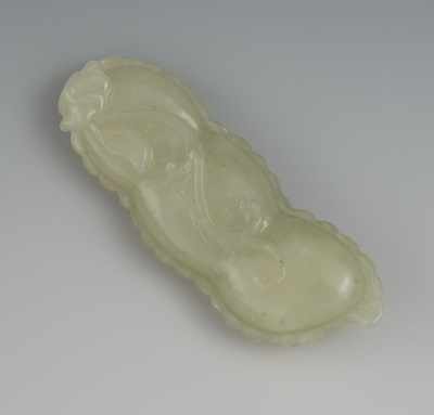 Appraisal: A Chinese Carved Jade Croton Bean Pendant Light grayish green