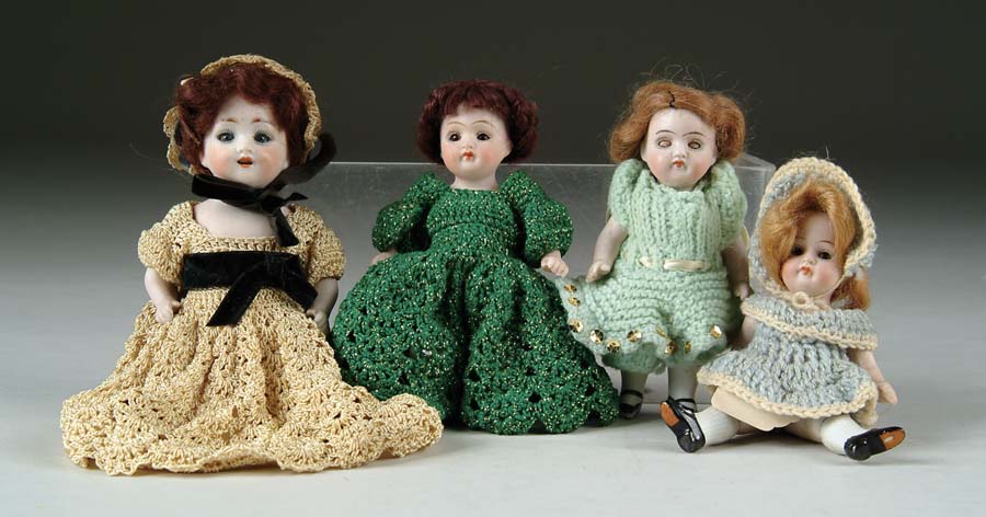 Appraisal: LOT OF FOUR GERMAN ALL-BISQUE DOLLS Lot includes three all-bisques