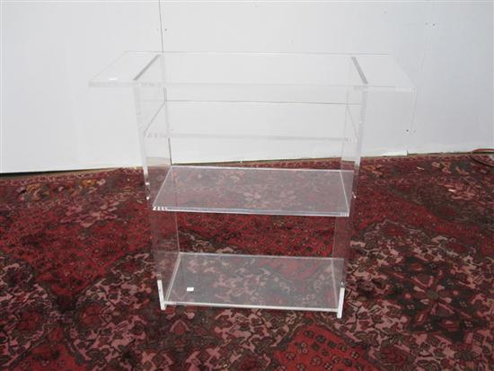 Appraisal: STAND A th C modern lucite four tier console stand